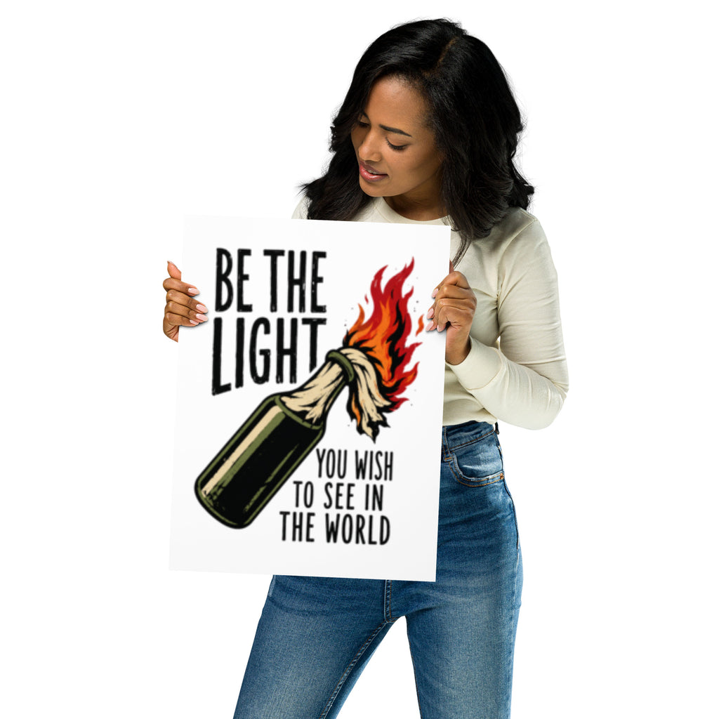Satirisk plakat med en brennende molotovcocktail og teksten Be the Light You Wish to See in the World.